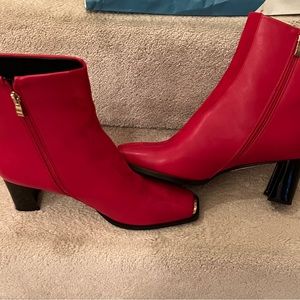 Gorgeous Red boot with stunning gold accents.  - New, never worn.